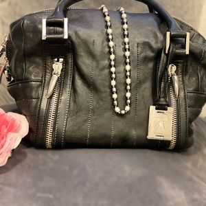 Rachael Zoe black leather purse.